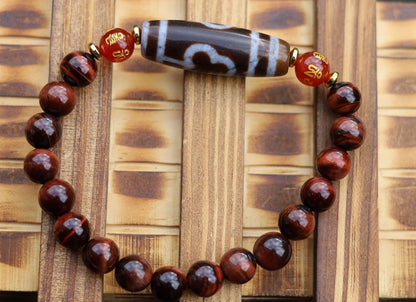 Old Bodhi Dzi  bead Tiger eye bracelet with Black agate.These beads are believed to bring spiritual benefits and protection to the wearer