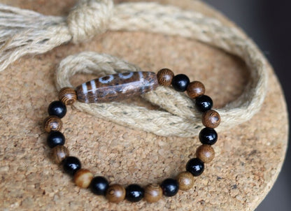 Old Eight-eye  eyed Dzi  bead Agate/ Burly wood bracelet . in all the spheres of life, why it can attract material and spiritual wealth