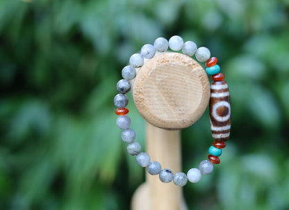 Old one eyed Dzi  bead Spectrolite bracelet with  Turquoise Howlite Beads with engraved Buddhist Tibetan decoration.