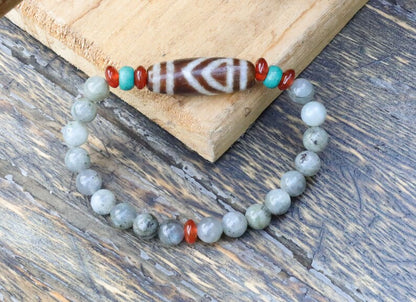 Old one eyed Dzi  bead Spectrolite bracelet with  Turquoise Howlite Beads with engraved Buddhist Tibetan decoration.