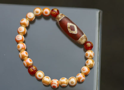 Old Two-eye Dzi  bead bracelet with Electroplate Glass Beads , Round with Evil Eye Pattern,Orange. unblock the path to enlightenment.