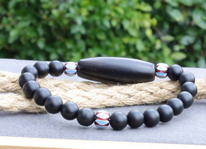 Old black Agate Dzi  bead matte Agate bracelet with Chevron-style tradebeads - originally made in Nepal.  providing a sense of emotional