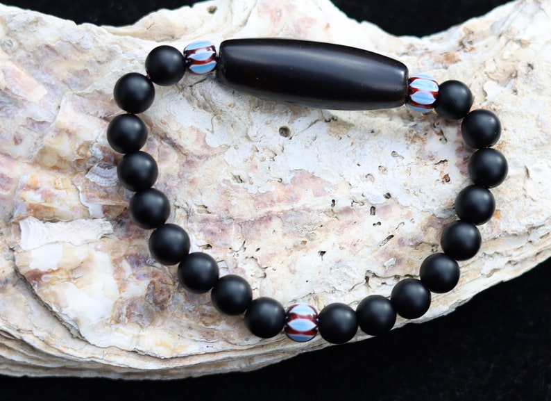 Old black Agate Dzi  bead matte Agate bracelet with Chevron-style tradebeads - originally made in Nepal.