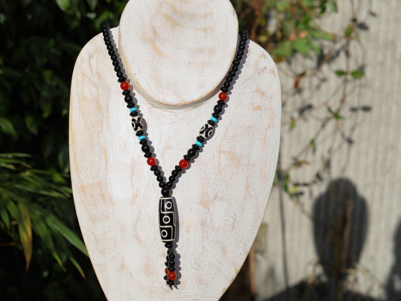 Splendid Nine-eye dZi bead necklace. It is called “The Star of Prosperity and the Heaven Protection”. Black white Dzi bead, protection, luck