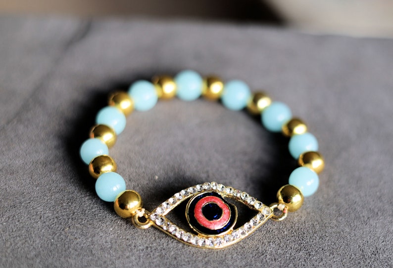Astonishing  Amazonite with Mahi Golden Color Red and Blue Meenakari work Evil Eye and gold plated specer beads. Perfect handmade gifts