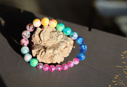 Flashy bracelets Pieces of beautiful mixed color amazing glass beads and holographic beads.is often associated with transparency, clarity