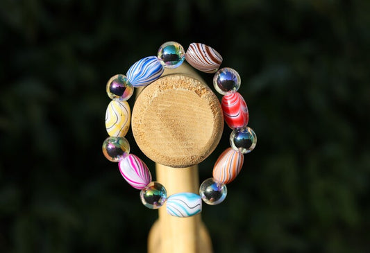 Flashy bracelets Pieces of beautiful mixed color amazing glass beads and holographic beads.is often associated with transparency, clarity