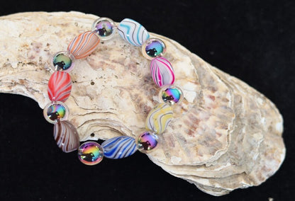 Flashy bracelets Pieces of beautiful mixed color amazing glass beads and holographic beads.is often associated with transparency, clarity