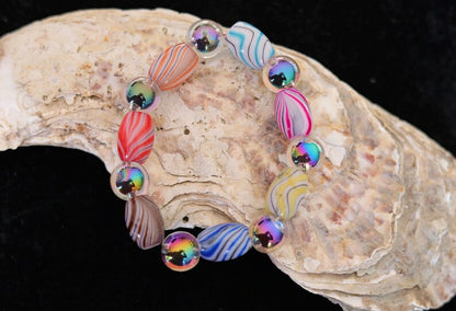 Flashy bracelets Pieces of beautiful mixed color amazing glass beads and holographic beads.is often associated with transparency, clarity