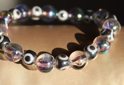 Flashy set bracelets with Electroplate Glass Beads  Round with Evil Eye  and Aurora Borealis. Also Gold plated spacer beads.