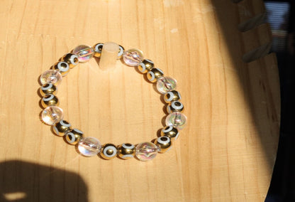 Flashy set bracelets with Electroplate Glass Beads  Round with Evil Eye  and Aurora Borealis. Also Gold plated spacer beads