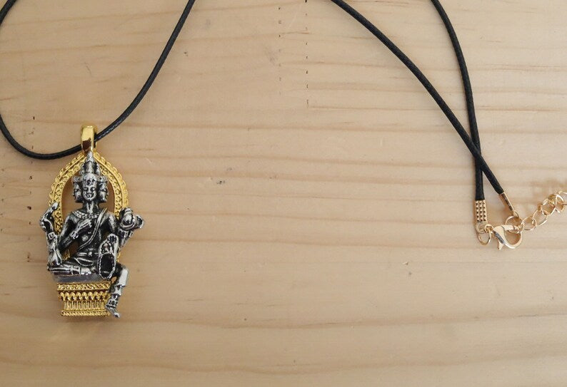 Exquisite Buddhist Sculpture Buddha Pendant necklace. Reminder of the path toward enlightenment and the pursuit of inner peace