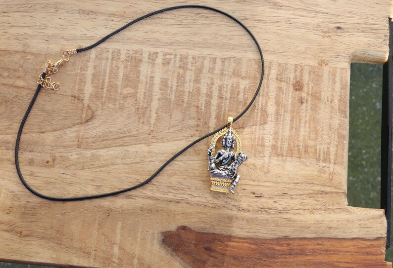 Exquisite Buddhist Sculpture Buddha Pendant necklace. Reminder of the path toward enlightenment and the pursuit of inner peace