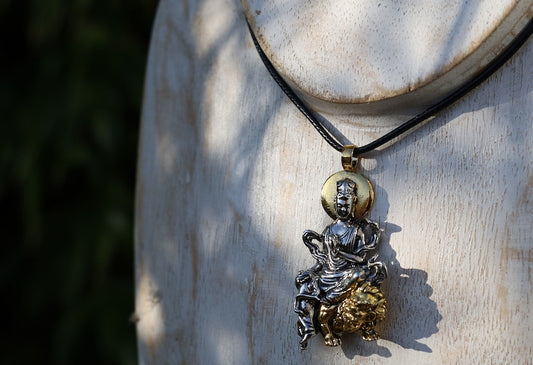 Particular Buddhist Sculpture Buddha Pendant necklace.  reverence for the Buddha's teachings, a reminder of mindfulness