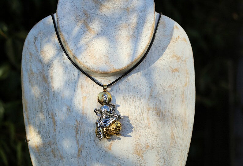 Particular Buddhist Sculpture Buddha Pendant necklace.  reverence for the Buddha's teachings, a reminder of mindfulness