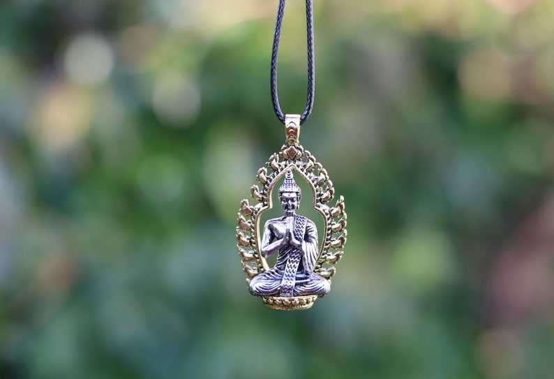 Noteworthy Buddhist Sculpture Buddha Pendant necklace. source of inspiration for leading a compassionate and mindful life