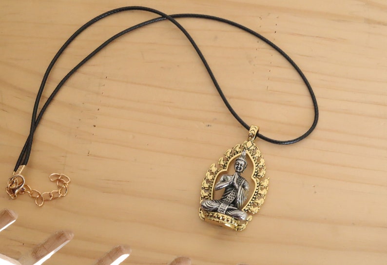 Noteworthy Buddhist Sculpture Buddha Pendant necklace. source of inspiration for leading a compassionate and mindful life