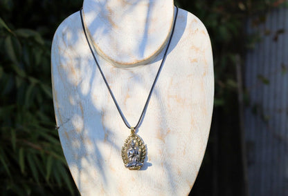Noteworthy Buddhist Sculpture Buddha Pendant necklace. source of inspiration for leading a compassionate and mindful life