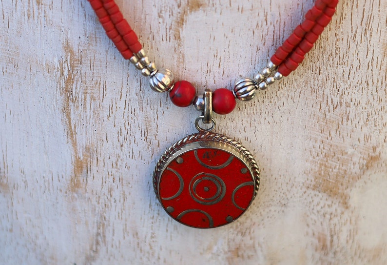 Limited Tibetan, Nepal Tibetan Coral Handmade Pendant necklace. Whether you're attending a special event or adding a touch of sophistication