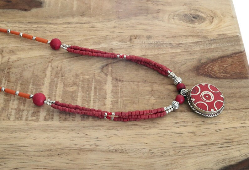Limited Tibetan, Nepal Tibetan Coral Handmade Pendant necklace. Whether you're attending a special event or adding a touch of sophistication