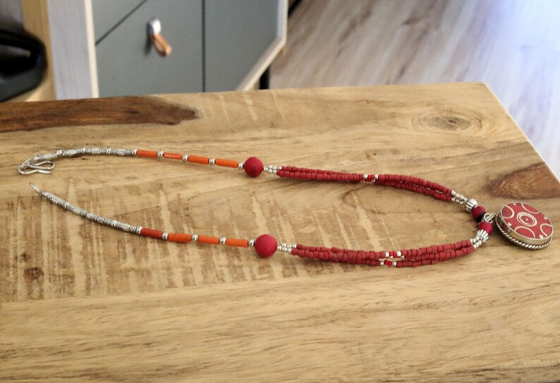 Limited Tibetan, Nepal Tibetan Coral Handmade Pendant necklace. Whether you're attending a special event or adding a touch of sophistication