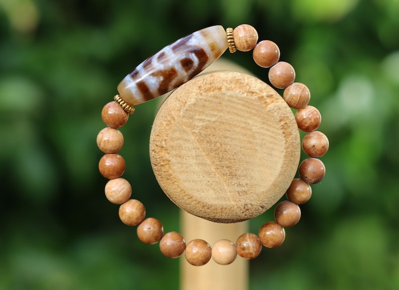 Old Fortune Wave dZi bead Wood Lace Agate bracelet. highly valued for its unique and eye-catching appearance. Rare find
