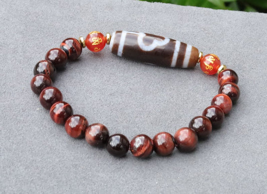 Old Bodhi Dzi  bead Tiger eye bracelet with Black agate.These beads are believed to bring spiritual benefits and protection to the wearer