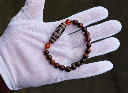 Old Bodhi Dzi  bead Tiger eye bracelet with Black agate.These beads are believed to bring spiritual benefits and protection to the wearer