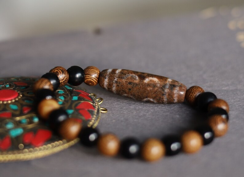 Old Eight-eye  eyed Dzi  bead Agate/ Burly wood bracelet . in all the spheres of life, why it can attract material and spiritual wealth