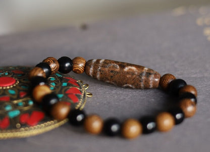 Old Eight-eye  eyed Dzi  bead Agate/ Burly wood bracelet . in all the spheres of life, why it can attract material and spiritual wealth