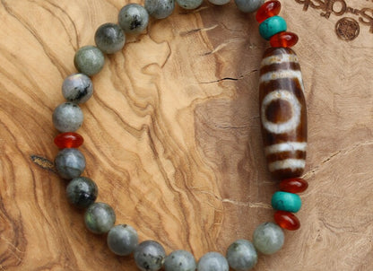 Old one eyed Dzi  bead Spectrolite bracelet with  Turquoise Howlite Beads with engraved Buddhist Tibetan decoration.