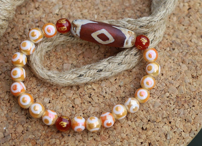 Old Two-eye Dzi  bead bracelet with Electroplate Glass Beads , Round with Evil Eye Pattern,Orange. unblock the path to enlightenment.