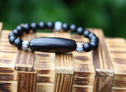 Old black Agate Dzi  bead matte Agate bracelet with Chevron-style tradebeads - originally made in Nepal.  providing a sense of emotional