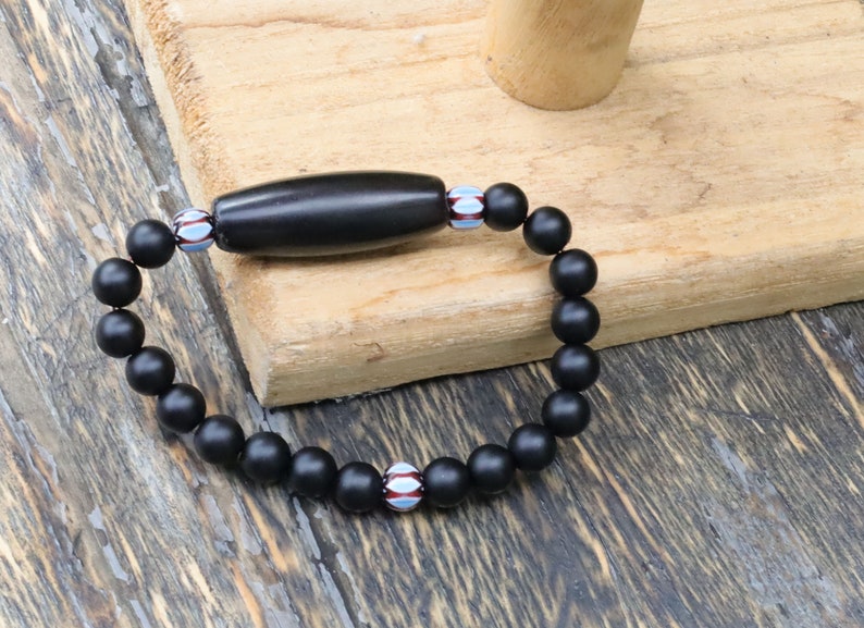Old black Agate Dzi  bead matte Agate bracelet with Chevron-style tradebeads - originally made in Nepal.