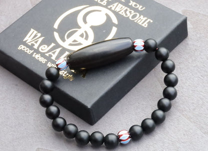 Old black Agate Dzi  bead matte Agate bracelet with Chevron-style tradebeads - originally made in Nepal.