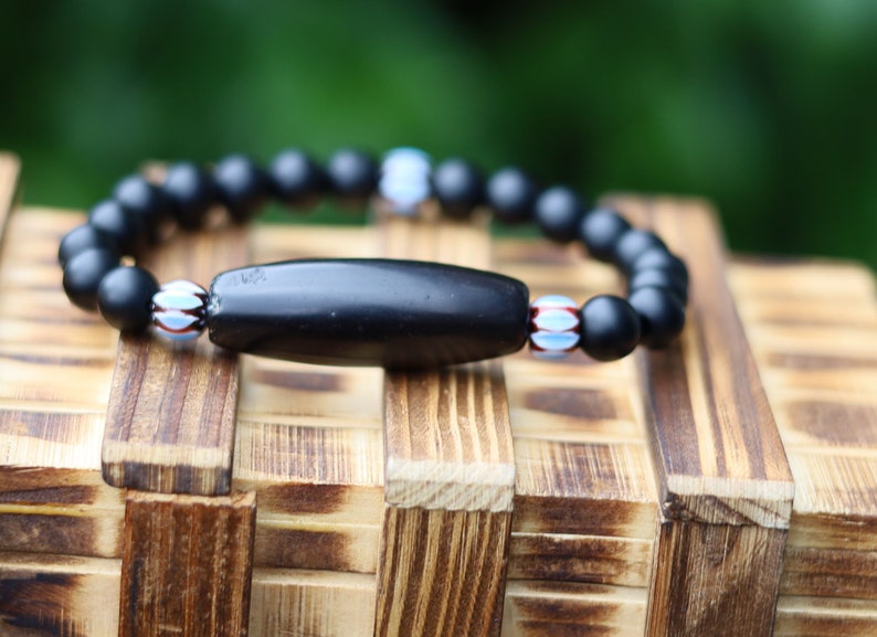 Old black Agate Dzi  bead matte Agate bracelet with Chevron-style tradebeads - originally made in Nepal.