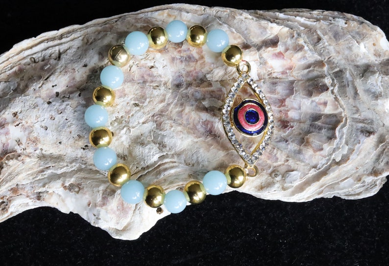 Astonishing  Amazonite with Mahi Golden Color Red and Blue Meenakari work Evil Eye and gold plated specer beads. Perfect handmade gifts