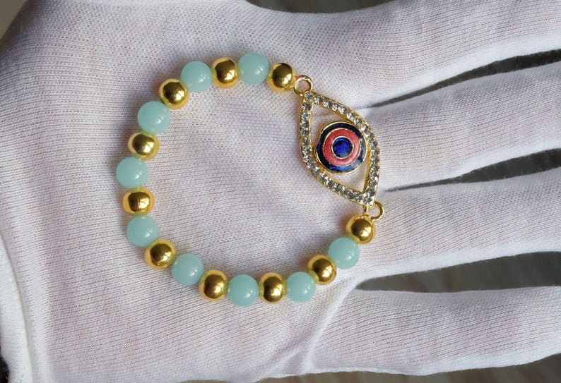 Astonishing  Amazonite with Mahi Golden Color Red and Blue Meenakari work Evil Eye and gold plated specer beads. Perfect handmade gifts