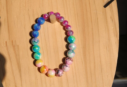 Flashy bracelets Pieces of beautiful mixed color amazing glass beads and holographic beads.is often associated with transparency, clarity