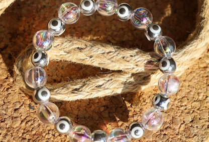 Flashy set bracelets with Electroplate Glass Beads  Round with Evil Eye  and Aurora Borealis. Also Gold plated spacer beads.