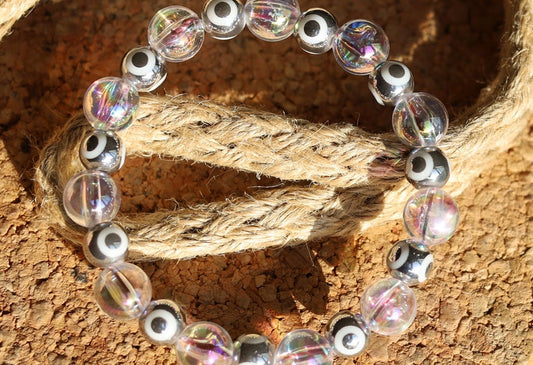 Flashy set bracelets with Electroplate Glass Beads  Round with Evil Eye  and Aurora Borealis. Also Gold plated spacer beads.