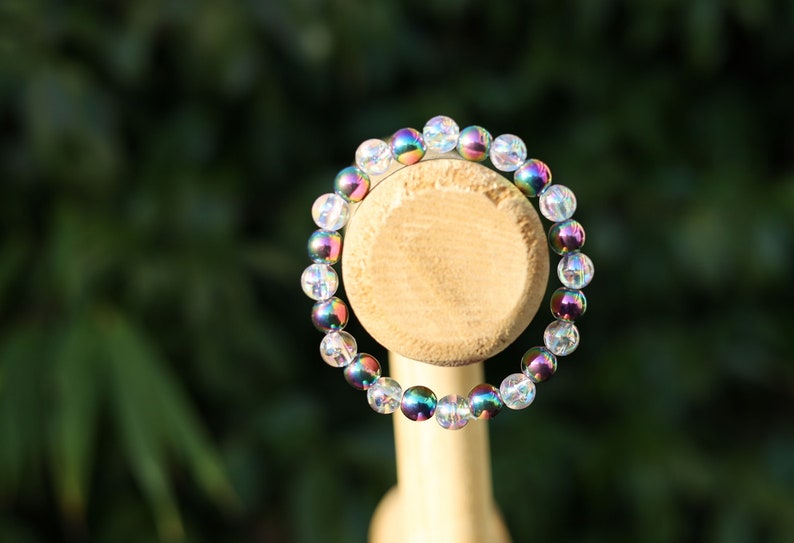 Flashy set bracelets with Electroplate Glass Beads  Round with Evil Eye  and Aurora Borealis. Also Gold plated spacer beads.