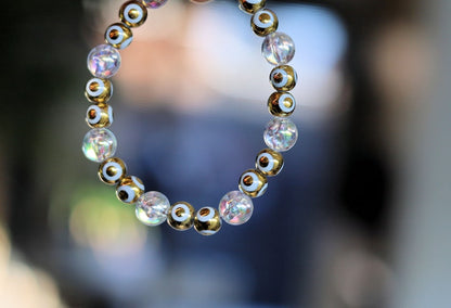 Flashy set bracelets with Electroplate Glass Beads  Round with Evil Eye  and Aurora Borealis. Also Gold plated spacer beads