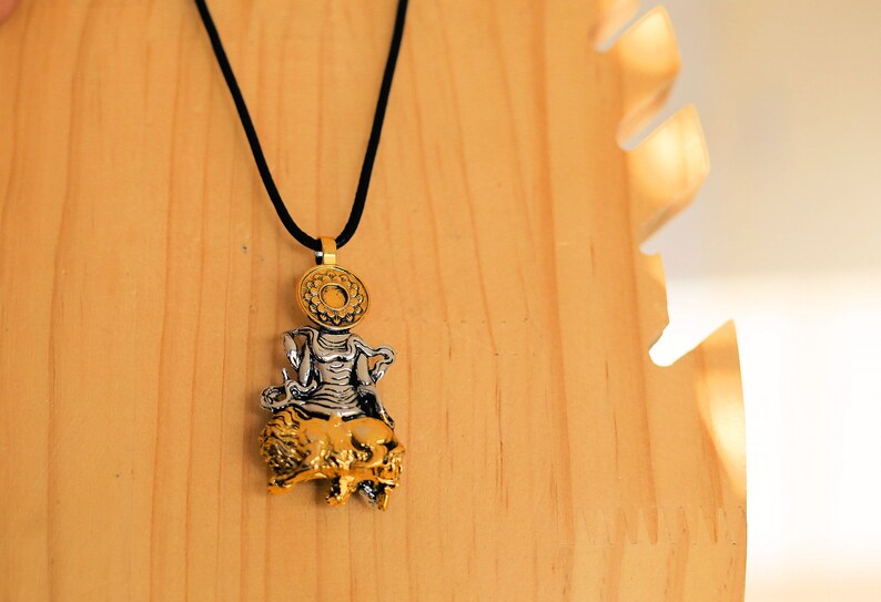 Particular Buddhist Sculpture Buddha Pendant necklace.  reverence for the Buddha's teachings, a reminder of mindfulness