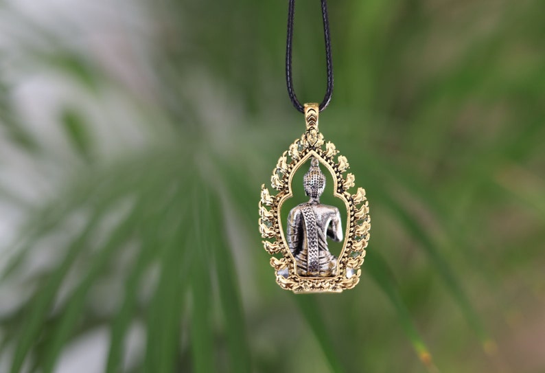 Noteworthy Buddhist Sculpture Buddha Pendant necklace. source of inspiration for leading a compassionate and mindful life