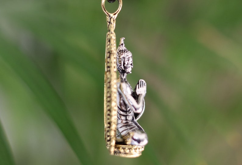 Noteworthy Buddhist Sculpture Buddha Pendant necklace. source of inspiration for leading a compassionate and mindful life
