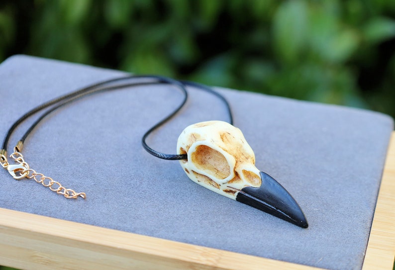 3D Raven Bird Skull Necklace. Each piece is a unique work of art, handcrafted from resin to capture the intricate details