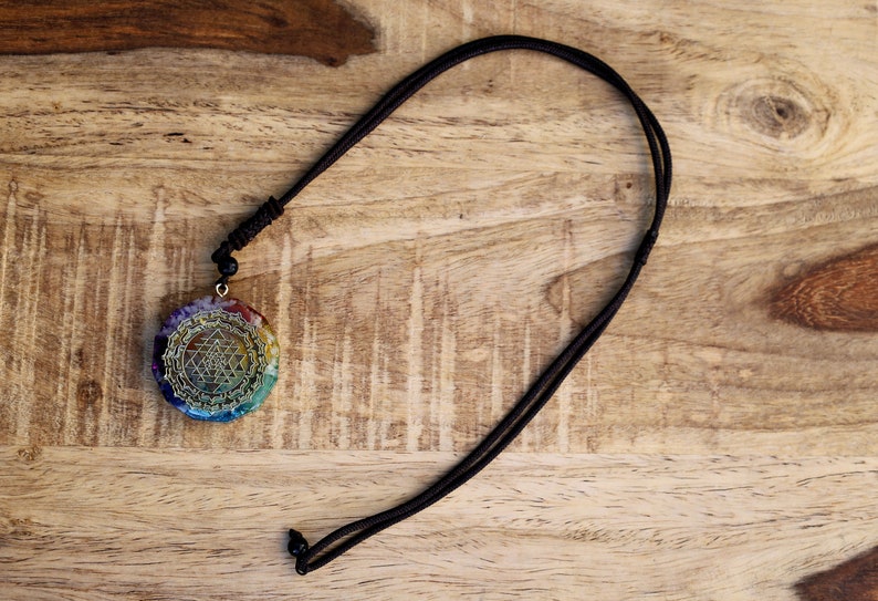 Orgonite, chakra, pendants including amethyst, lapis lazuli, turquoise, green aventurine, citrine, carnelian and Red jasper.