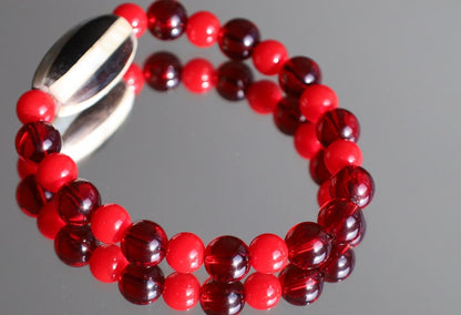 One of a kind Mexico red blood beeswax beads Certified 8mm. Combined with Crimson Burst Flower Stone and  Mother of Pearl Black.
