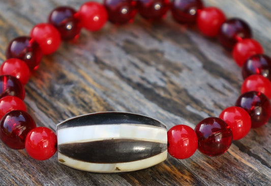 One of a kind Mexico red blood beeswax beads Certified 8mm. Combined with Crimson Burst Flower Stone and  Mother of Pearl Black.